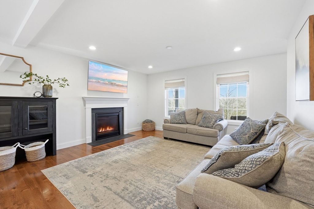 103 Rice Corner Road Brookfield, MA 01506 - Photo 15 of 39 a living room with furniture and a fireplace