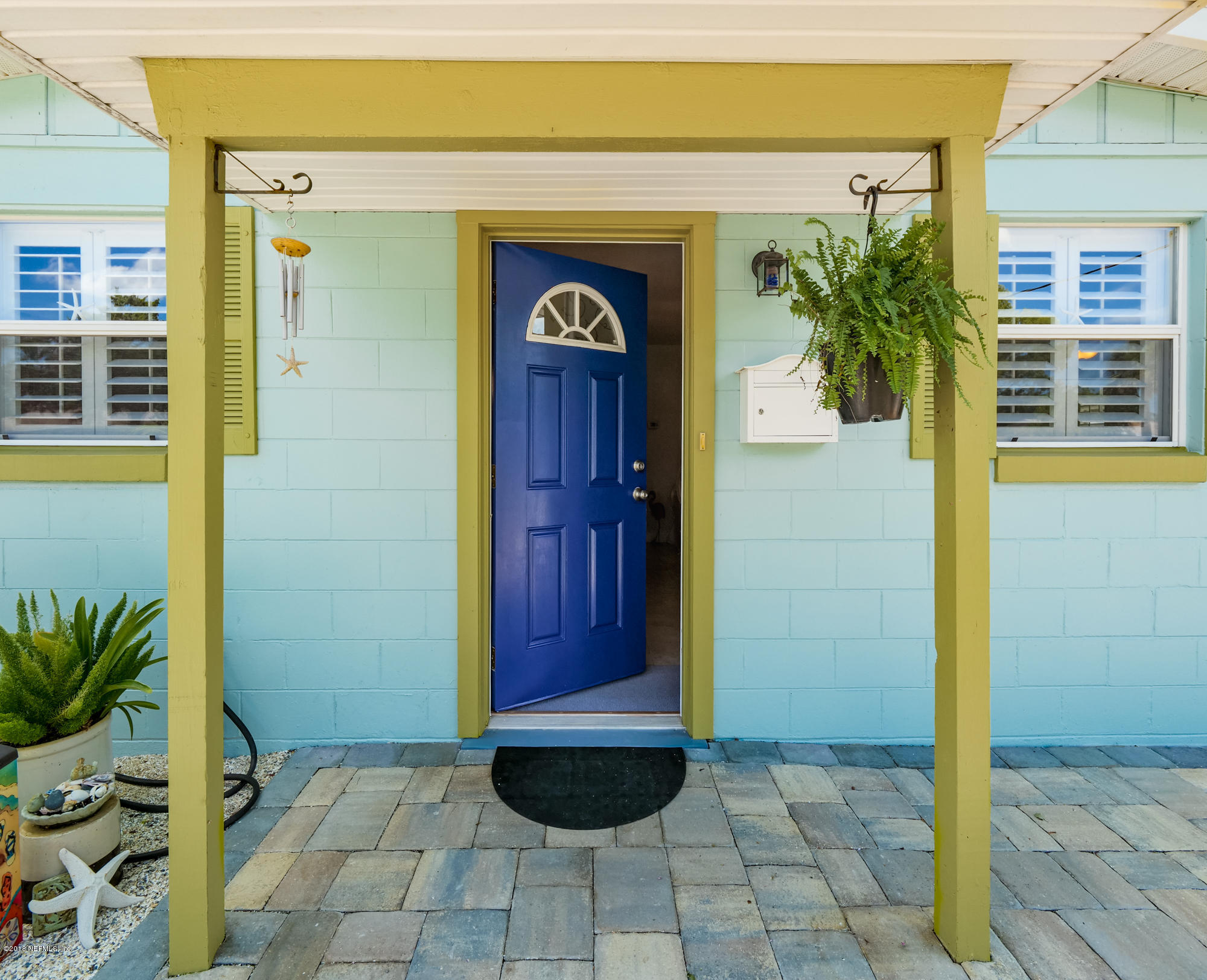 456 Irex Road Atlantic Beach, FL 32233 - Photo 1 of 29 a view of entryway front of a house