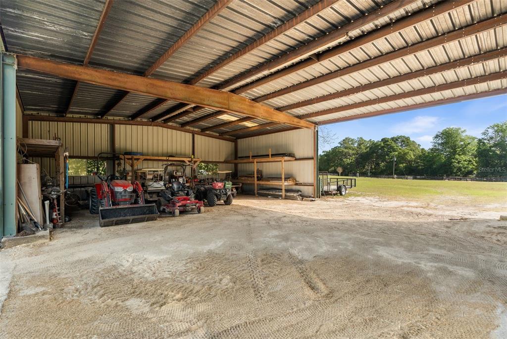 16525 Southwest 5th Place Newberry, FL 32669 - Photo 17 of 55 a view of a bike garage