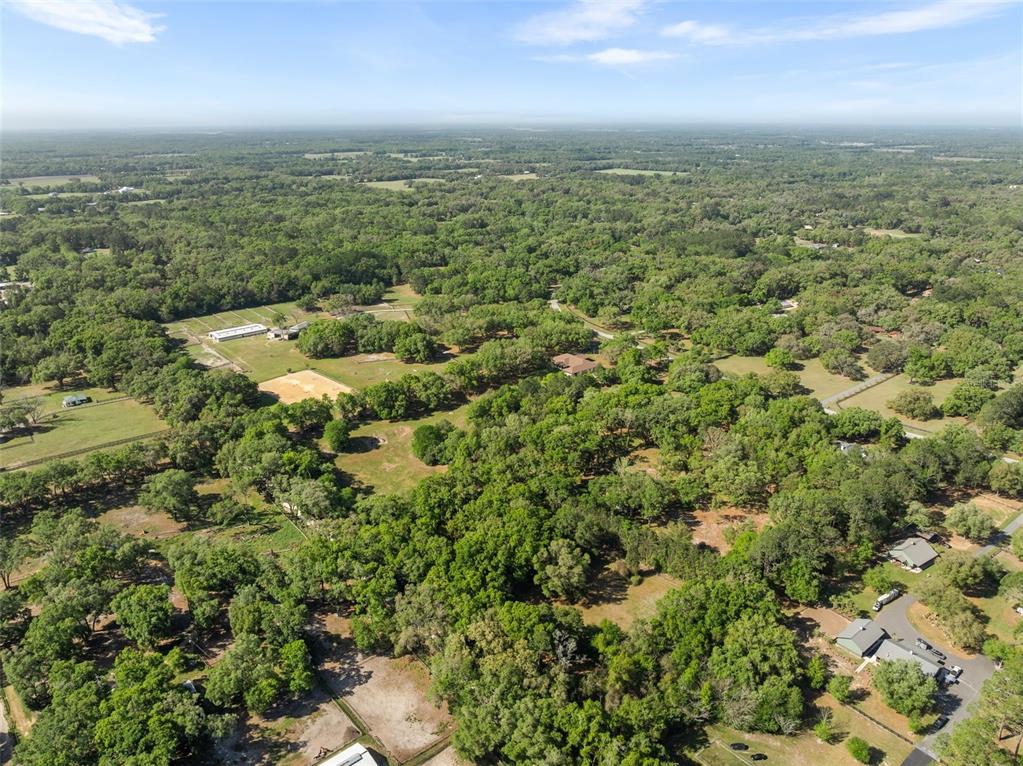 16525 Southwest 5th Place Newberry, FL 32669 - Photo 31 of 55 an aerial view of a house with a yard