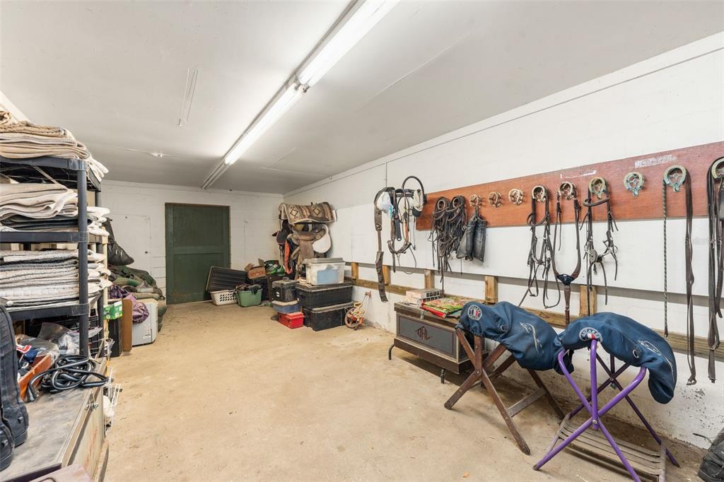 16525 Southwest 5th Place Newberry, FL 32669 - Photo 51 of 55 a living room with furniture a bike and a window