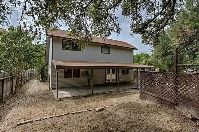 7801 Coldstream Drive Austin, TX 78748 - Photo 20 of 20 Back of property featuring a fenced backyard and a patio area