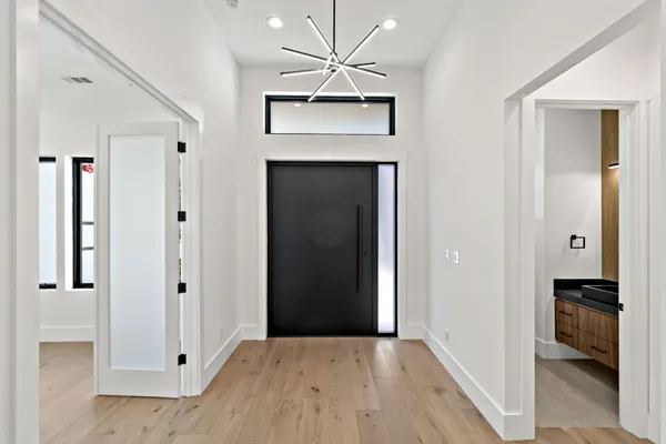 a view of an empty room with cabinet