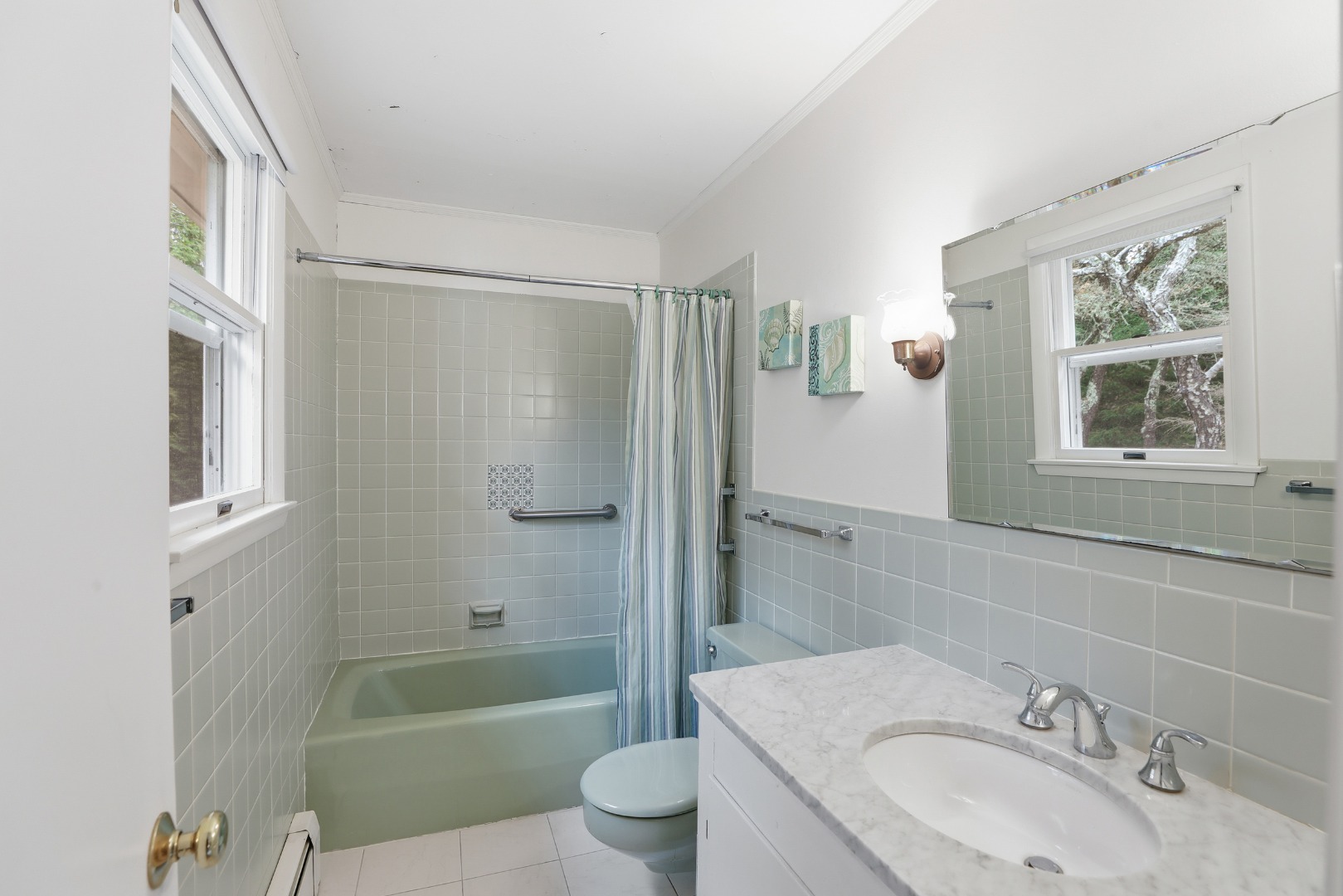 10 Pease Point Road Edgartown, MA 02539 - Photo 10 of 21 a bathroom with a sink toilet and shower