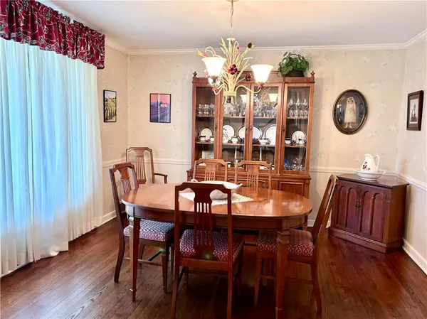 a kitchen with a sink cabinets and window