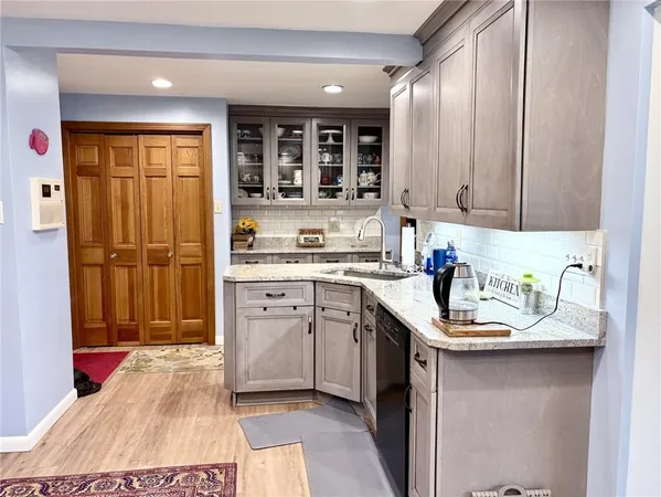 a room with furniture and a book shelf