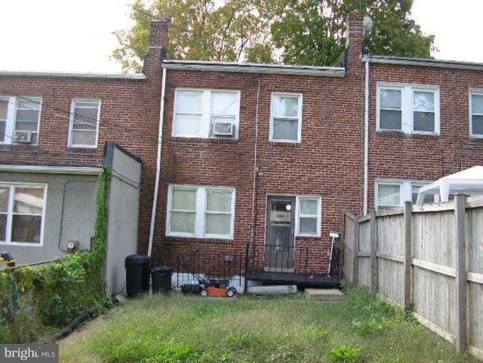 3912 Flowerton Road Baltimore, MD 21229 - Photo 8 of 8 front view of a house with a yard