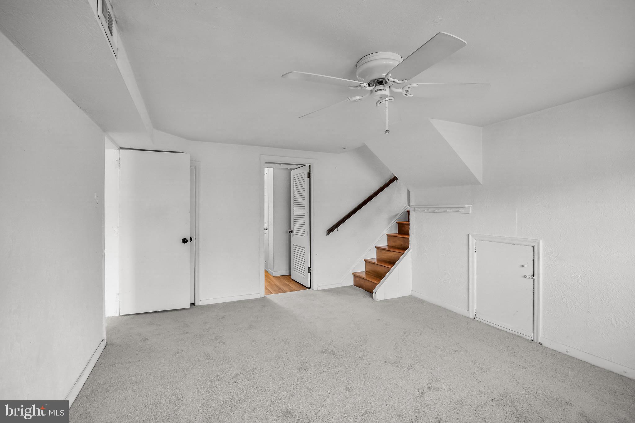 300 Copley Road Haddonfield, NJ 08033 - Photo 11 of 27 a view of an empty room with stairs