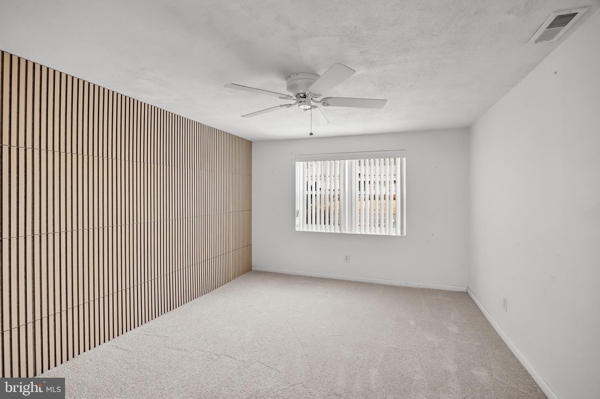 300 Copley Road Haddonfield, NJ 08033 - Photo 13 of 27 a view of an empty room with a window