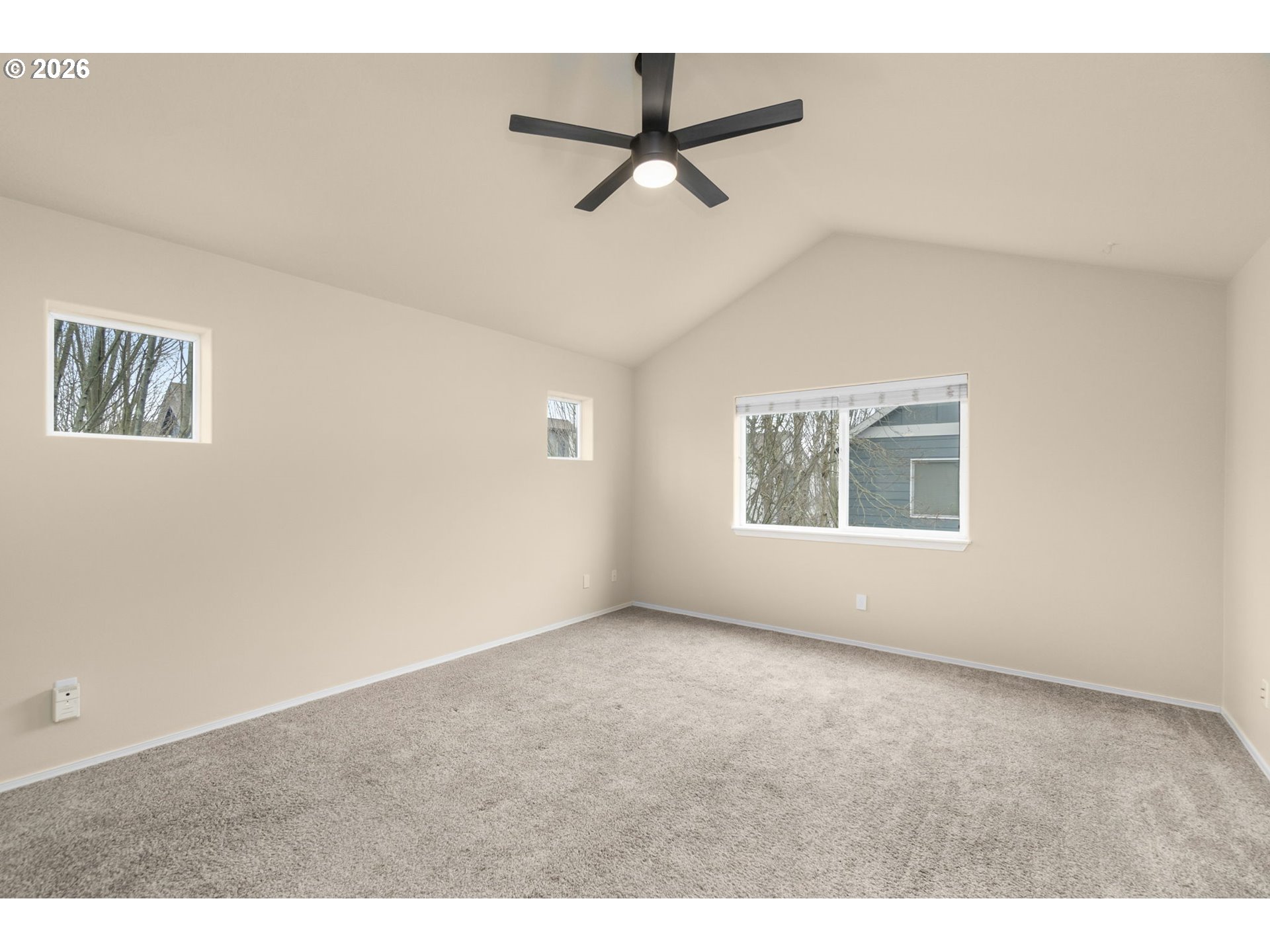 17428 Southwest September Lane Beaverton, OR 97003 - Photo 11 of 23 a view of an empty room with a window