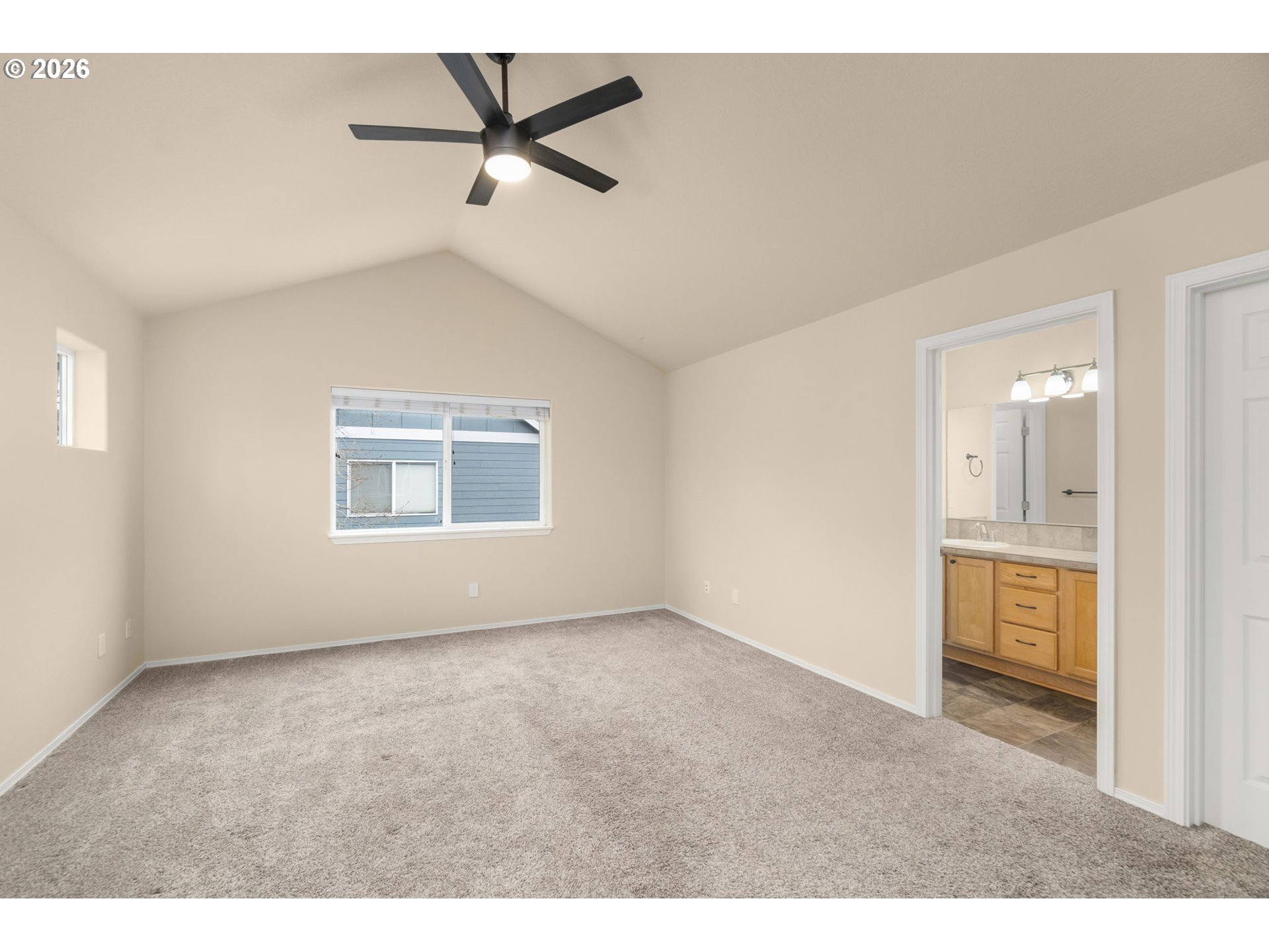 17428 Southwest September Lane Beaverton, OR 97003 - Photo 12 of 23 a view of an empty room and a kitchen view