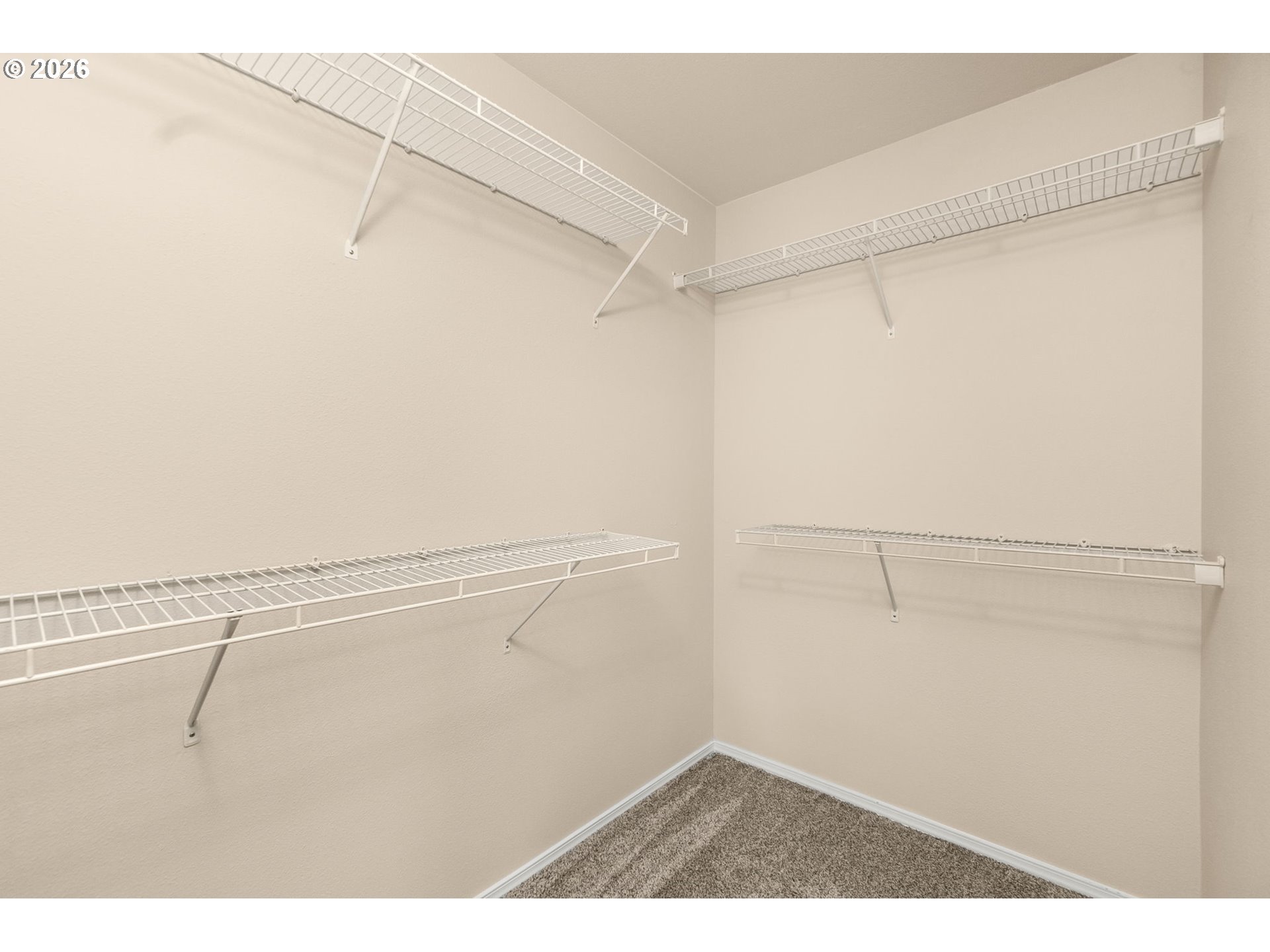 17428 Southwest September Lane Beaverton, OR 97003 - Photo 15 of 23 a view of a room with racks on the wall