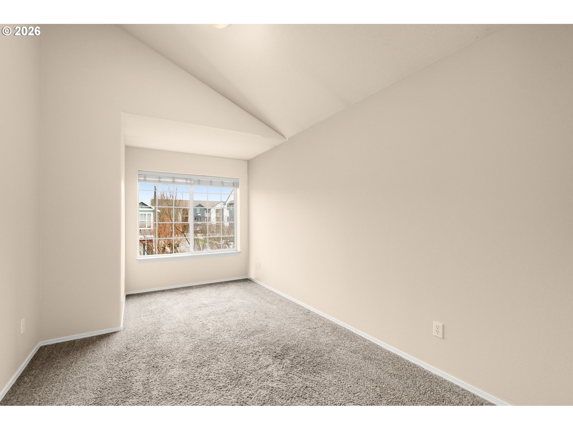 17428 Southwest September Lane Beaverton, OR 97003 - Photo 16 of 23 a view of an empty room with a window