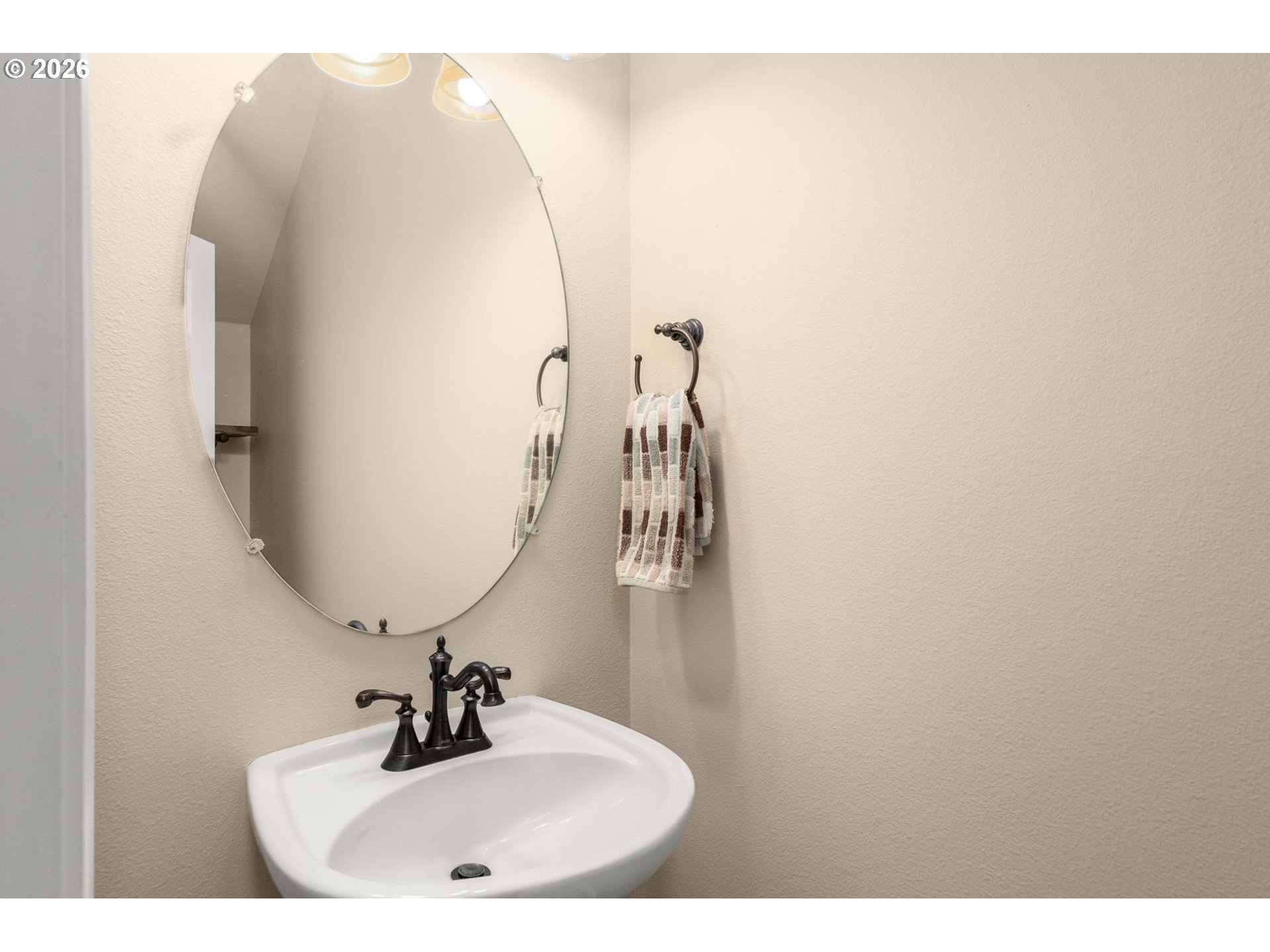 17428 Southwest September Lane Beaverton, OR 97003 - Photo 18 of 23 a bathroom with a sink and mirror