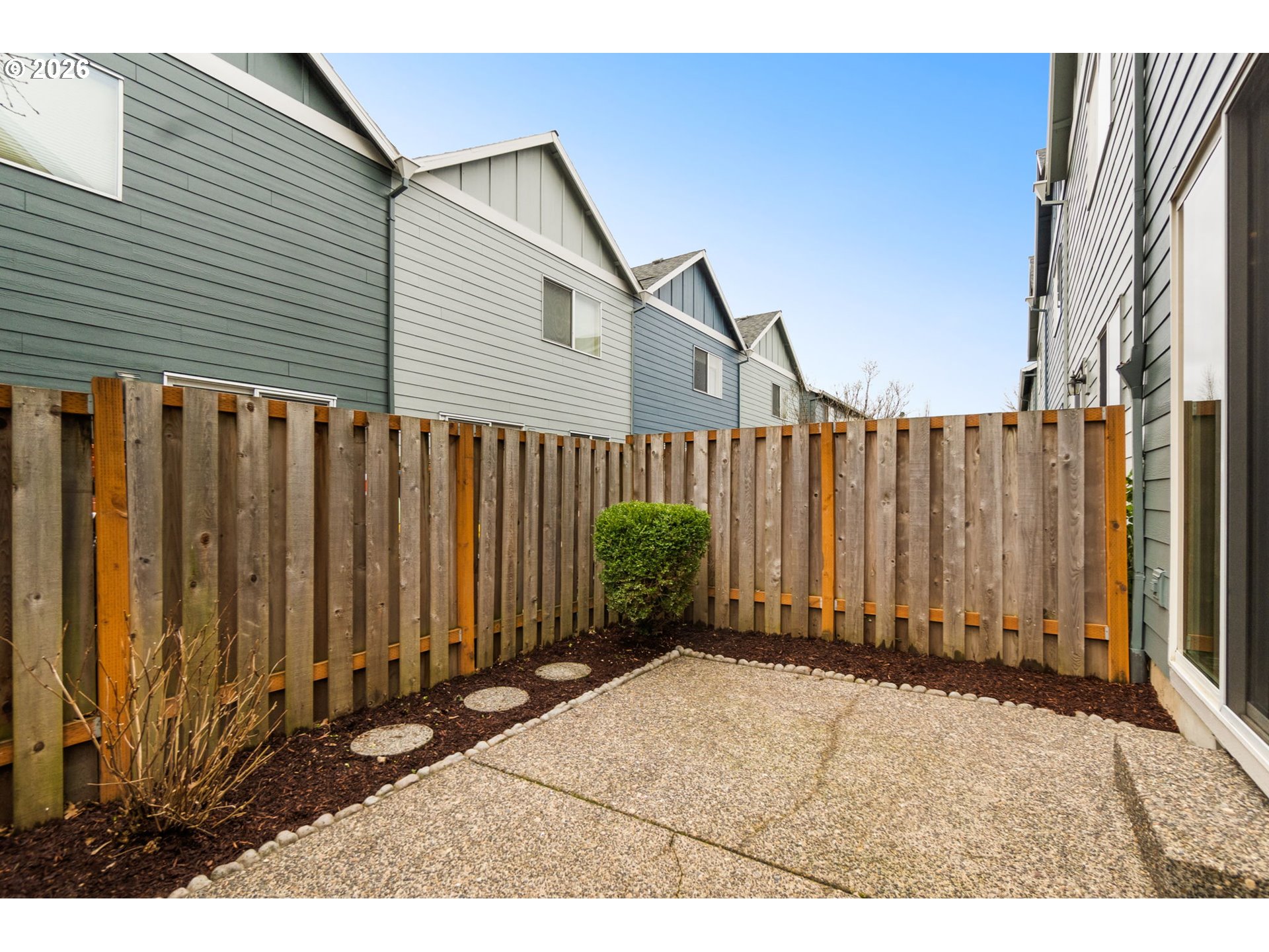 17428 Southwest September Lane Beaverton, OR 97003 - Photo 22 of 23 a view of a house with wooden fence