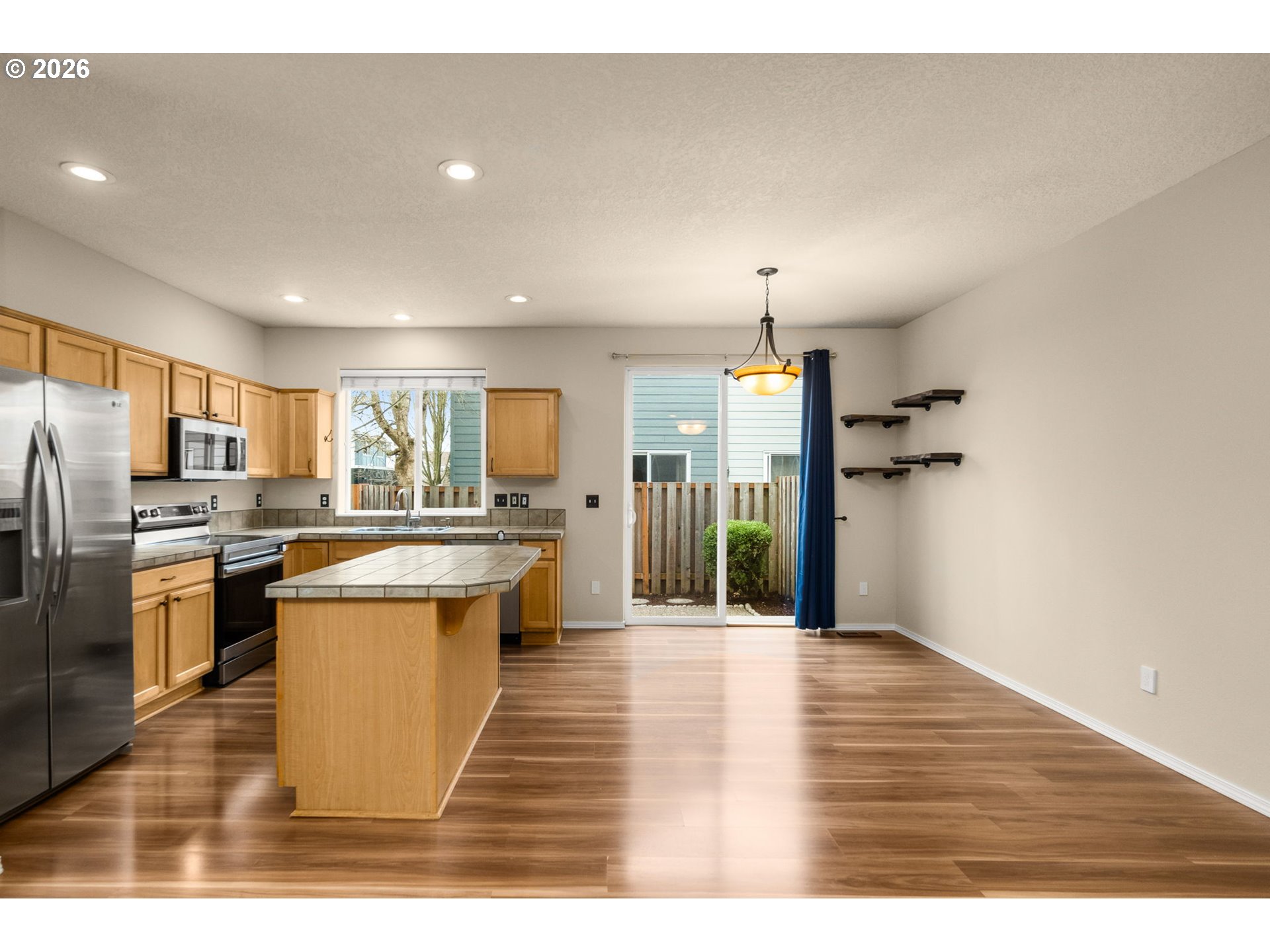 17428 Southwest September Lane Beaverton, OR 97003 - Photo 5 of 23 a large kitchen with a lot of counter space
