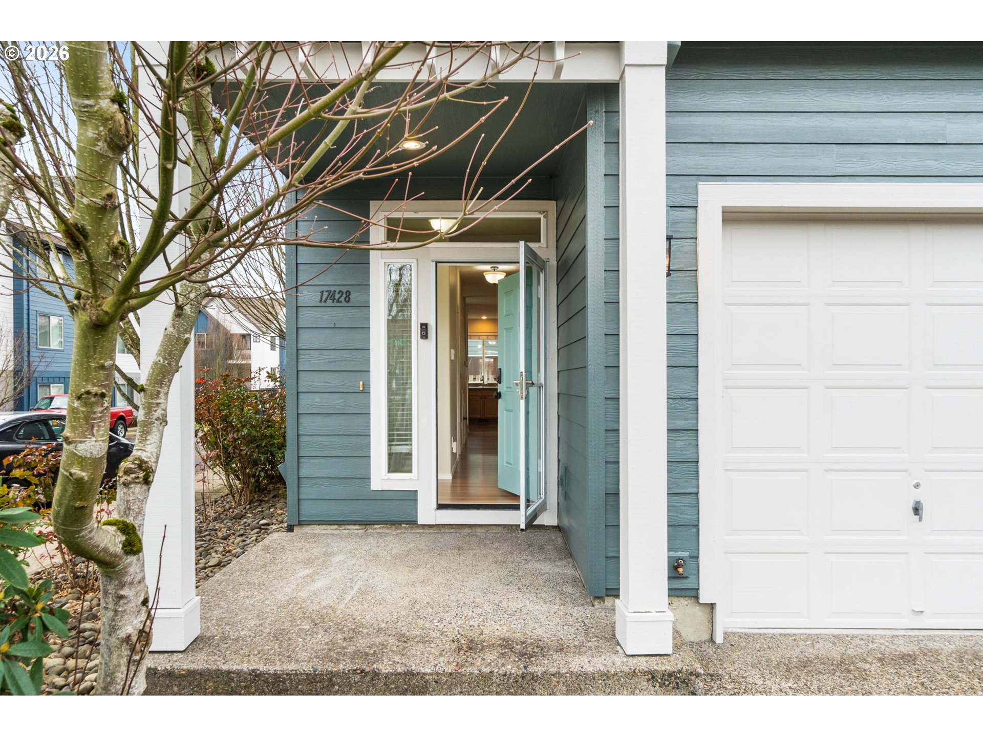 17428 Southwest September Lane Beaverton, OR 97003 - Photo 9 of 23 a view of a wooden house with a small yard