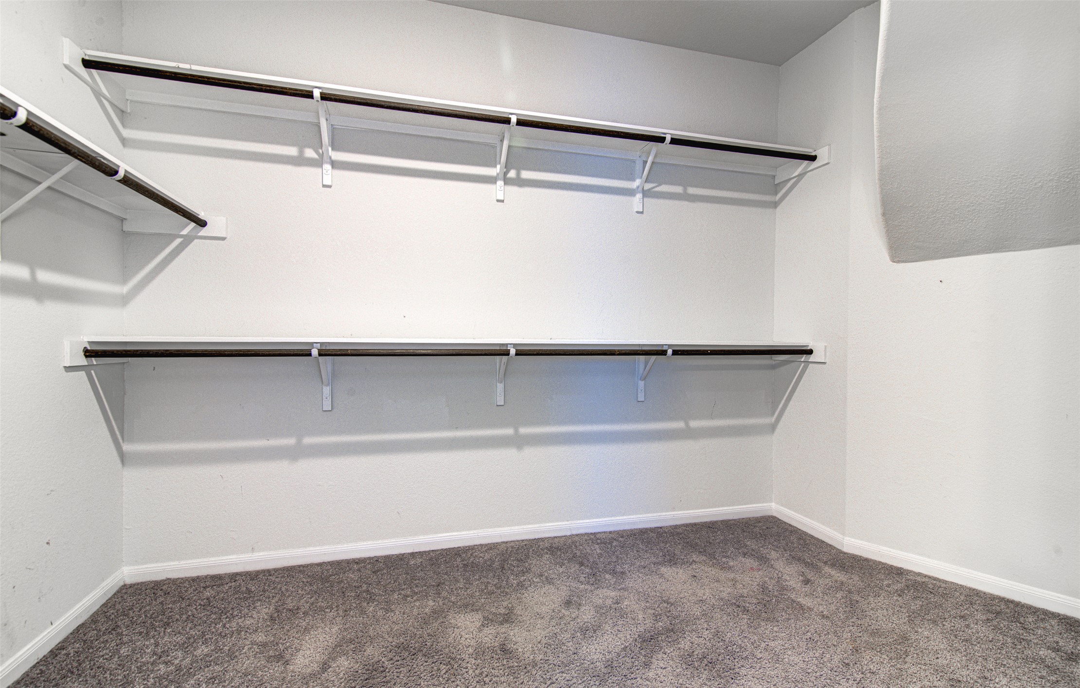 774 Cherrystone Loop Buda, TX 78610 - Photo 20 of 38 Ample shelving and hanging space defines this well-organized closet.