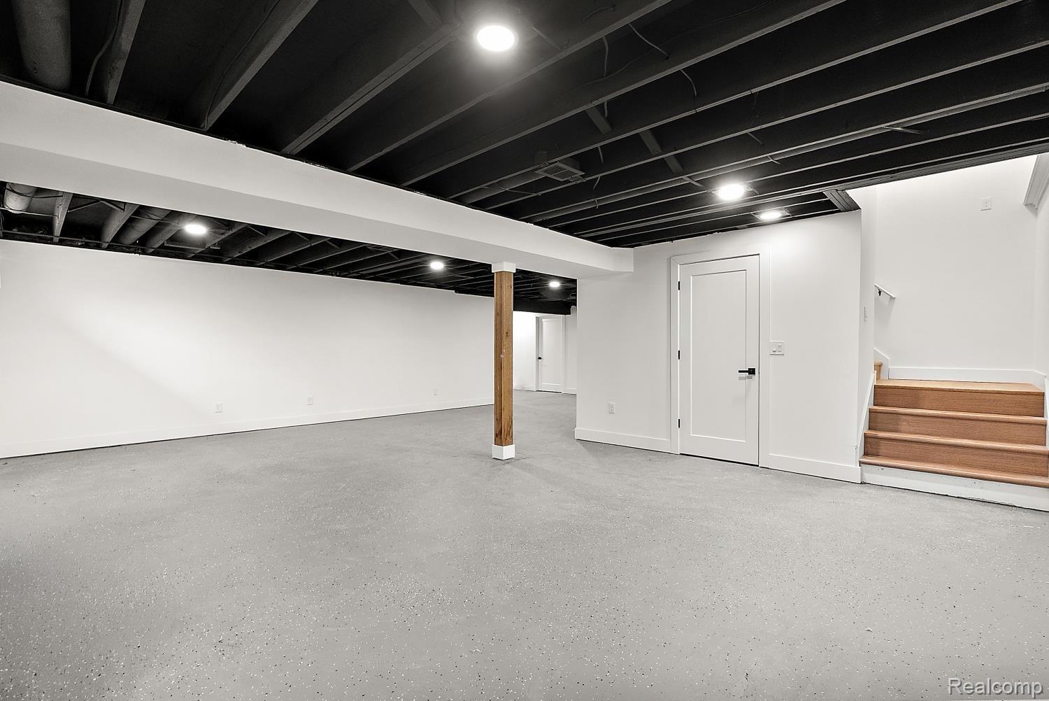 13392 Belsay Road Millington, MI 48746 - Photo 15 of 18 Expansive lower level with concrete flooring, recessed lighting, and white walls