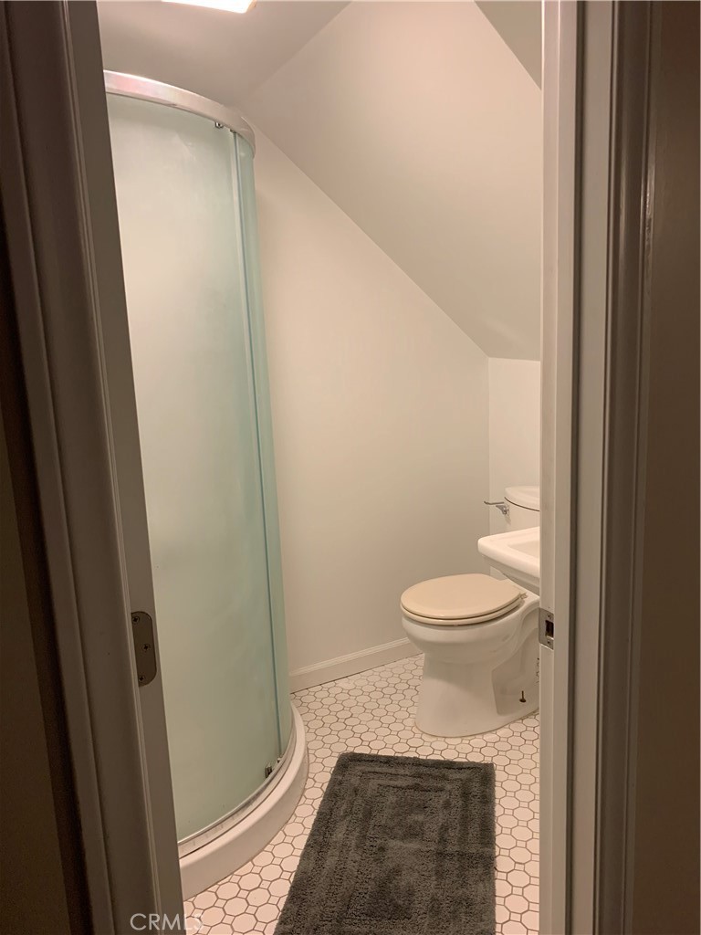 412 North Rose Avenue, Unit A Compton, CA 90221 - Photo 5 of 10 a bathroom with a toilet and a shower