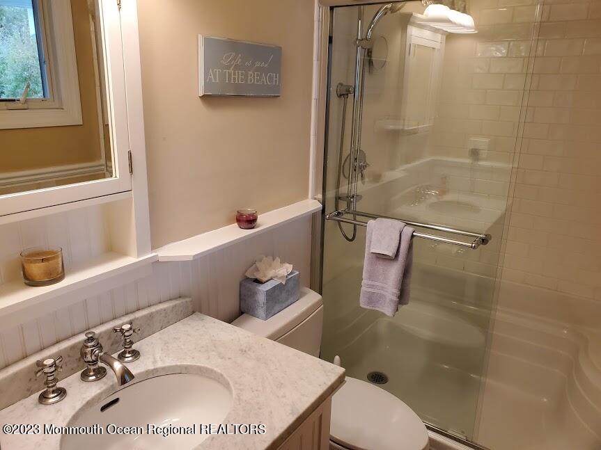 218 Bridge Avenue Point Pleasant Beach, NJ 08742 - Photo 15 of 19 a bathroom with a sink toilet and shower