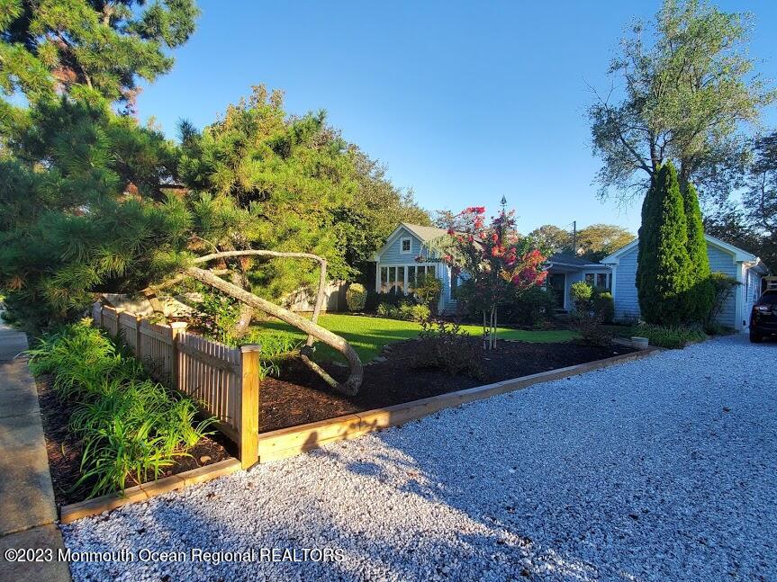 218 Bridge Avenue Point Pleasant Beach, NJ 08742 - Photo 4 of 19 a view of a house with a yard