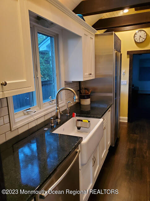 218 Bridge Avenue Point Pleasant Beach, NJ 08742 - Photo 6 of 19 a kitchen with a stove and a sink