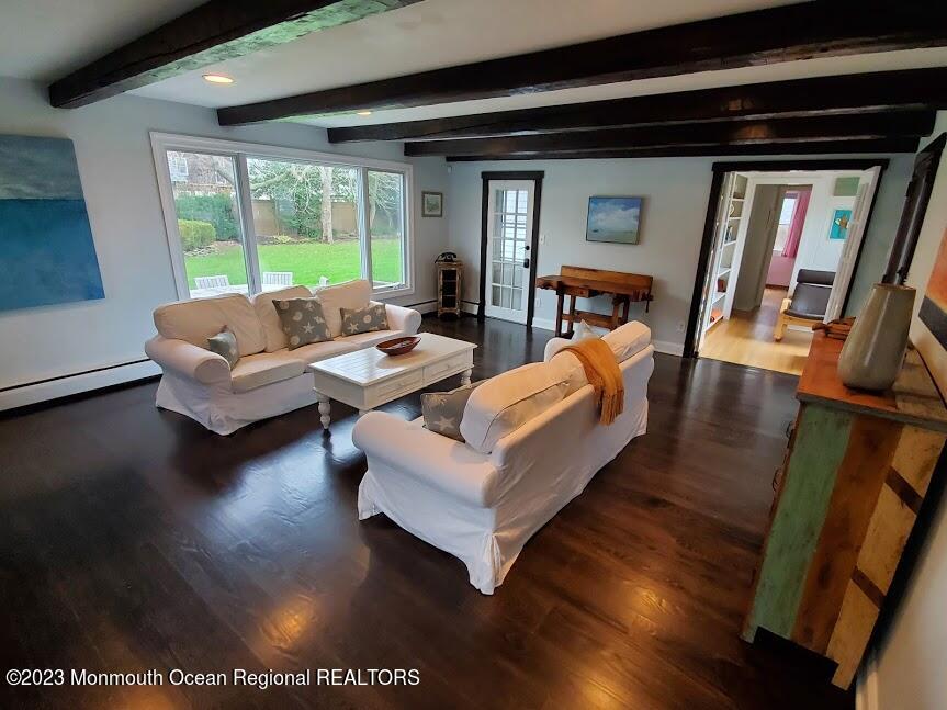 218 Bridge Avenue Point Pleasant Beach, NJ 08742 - Photo 10 of 19 a living room with furniture and a large window