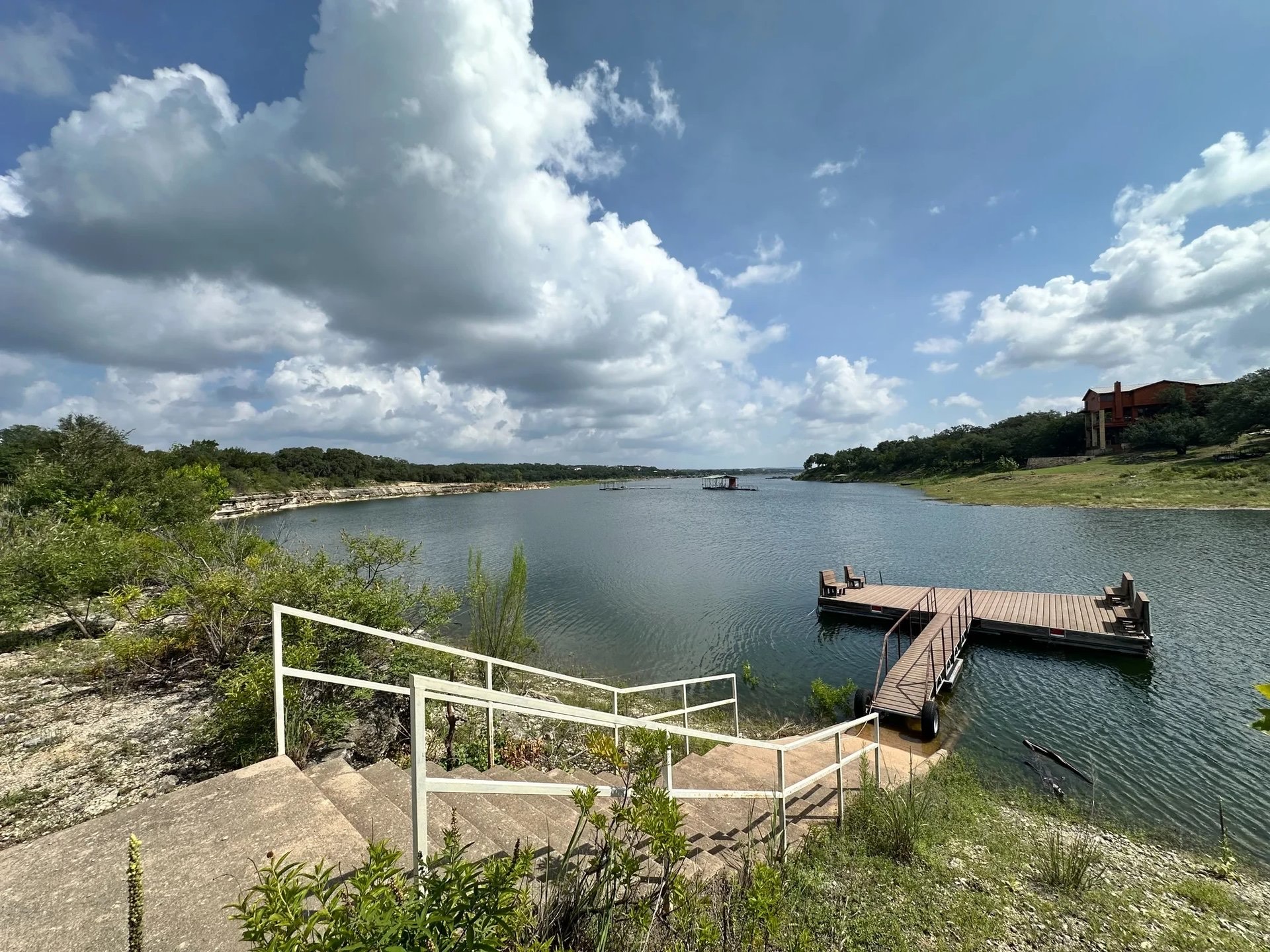 604 Cutty Trail Lakeway, TX 78734 - Photo 35 of 40 a view of a lake with a terrace