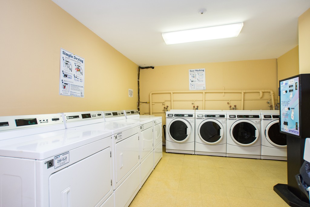 280 Commonwealth Avenue, Unit G9 Boston, MA 02116 - Photo 15 of 18 a utility room with dryer and washer