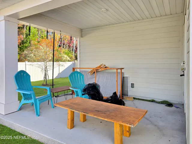 a room with furniture and a window