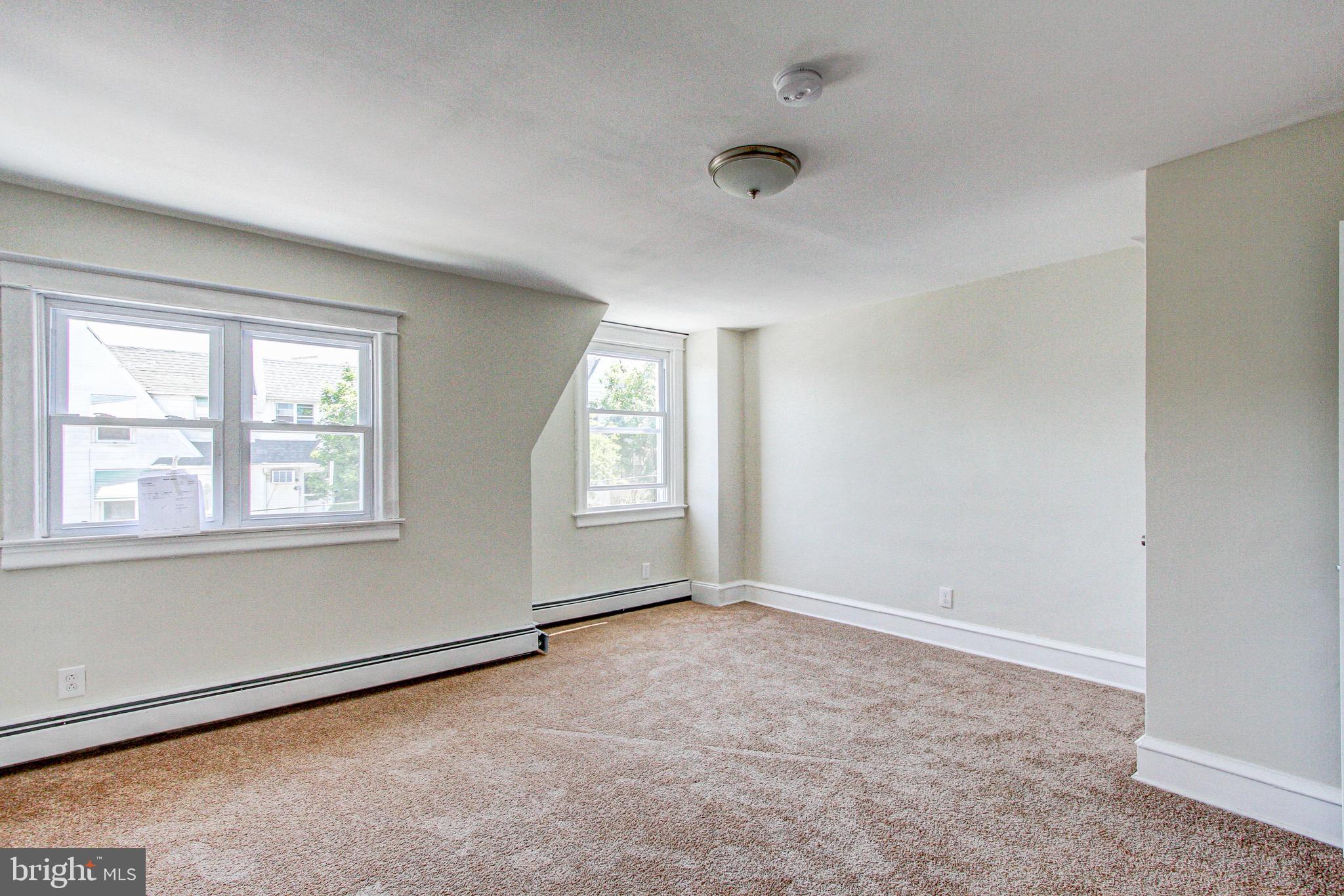 524 Glendale Road Upper Darby, PA 19082 - Photo 34 of 51 an empty room with windows