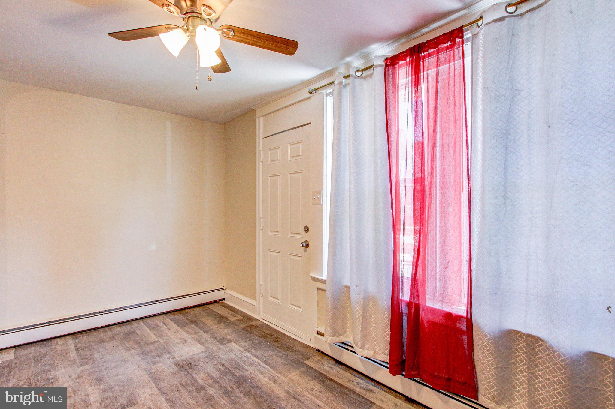 524 Glendale Road Upper Darby, PA 19082 - Photo 9 of 51 a view of a room with window and ceiling fan
