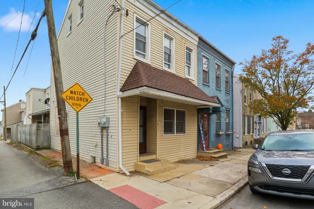 a car parked in front of a house