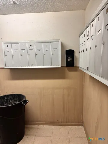 a couple of cars parked in front of a house