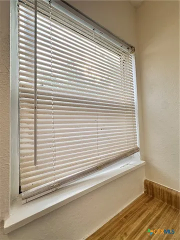 a view of a window and a balcony