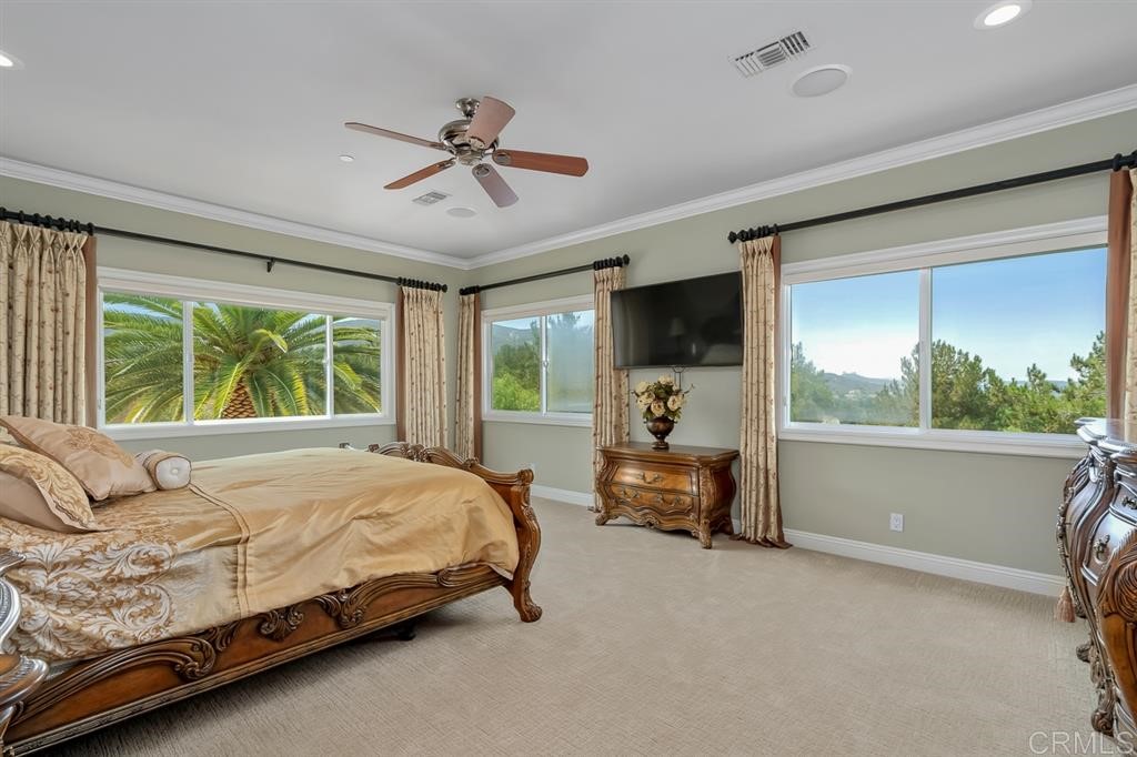 13410 Farraday Ridge Road Jamul, CA 91935 - Photo 11 of 23 a bedroom with a bed and a couch