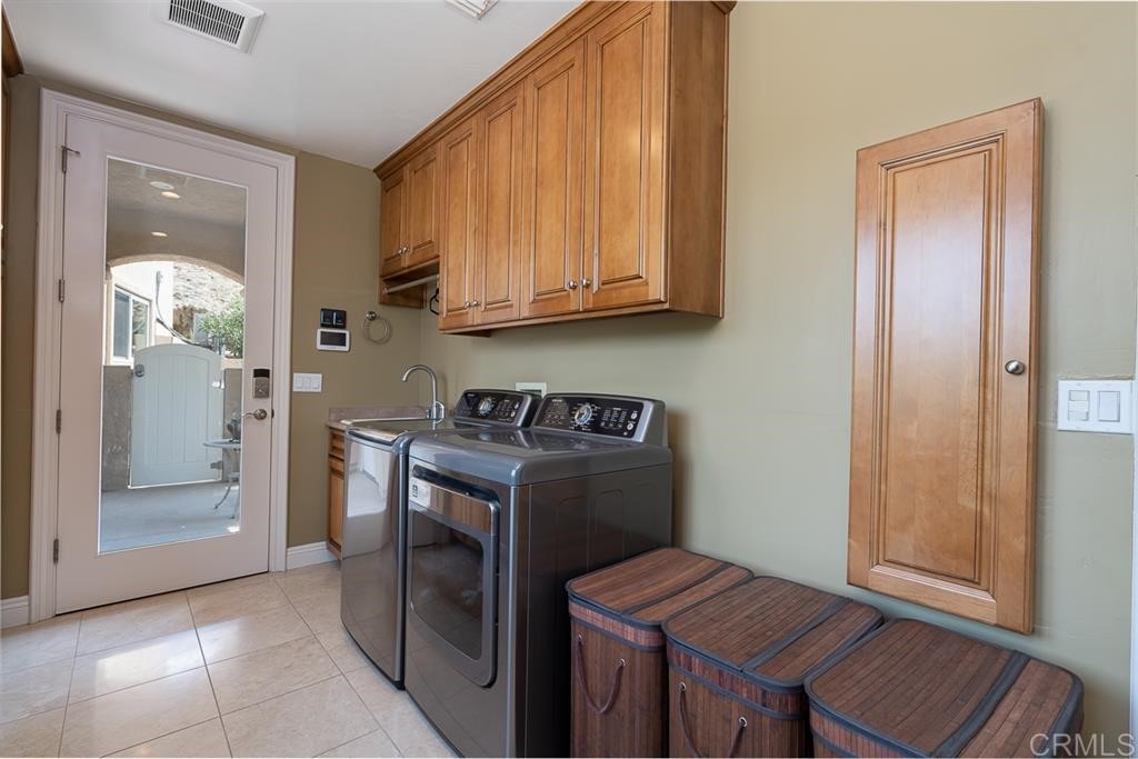 13410 Farraday Ridge Road Jamul, CA 91935 - Photo 14 of 23 a view of room with washer and dryer