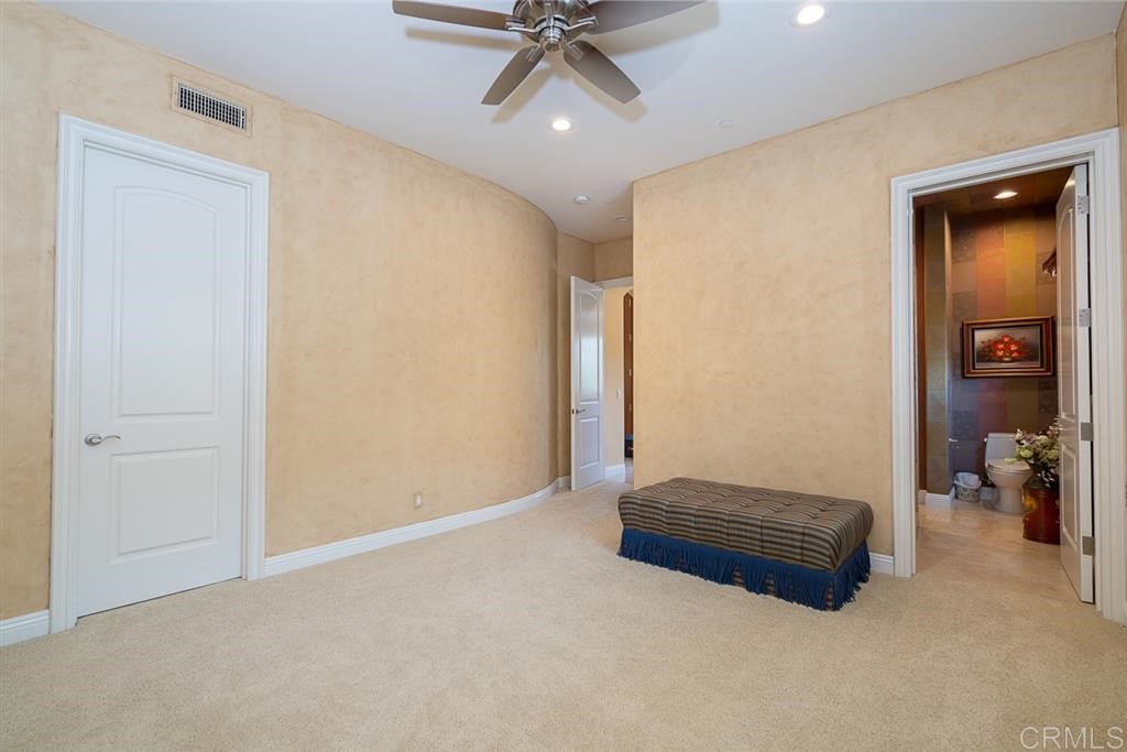 13410 Farraday Ridge Road Jamul, CA 91935 - Photo 17 of 23 a living room with furniture and a ceiling fan