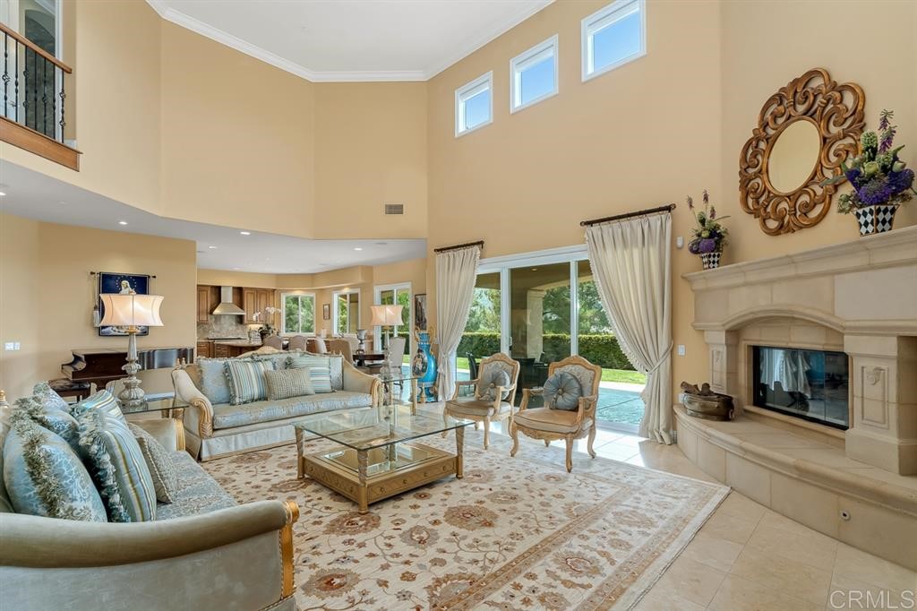 13410 Farraday Ridge Road Jamul, CA 91935 - Photo 3 of 23 a living room with furniture and a fireplace