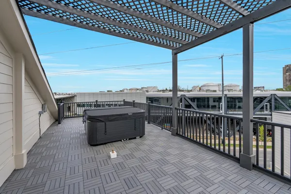 a view of roof deck with patio