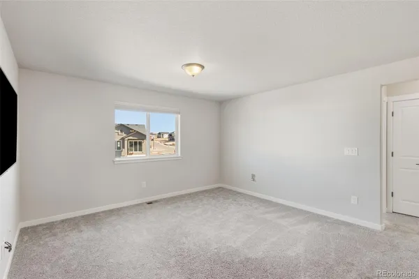 an empty room with a window