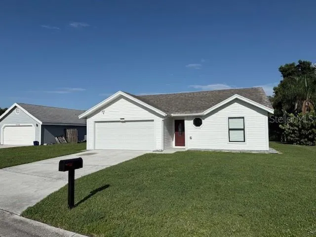 a house view with a garden space