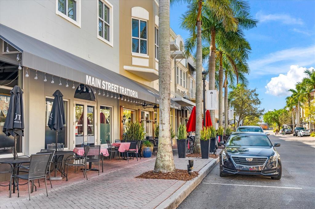 3540 65th Ave Circle East Sarasota, FL 34243 - Photo 57 of 69 a view of a parked cars in front of a building