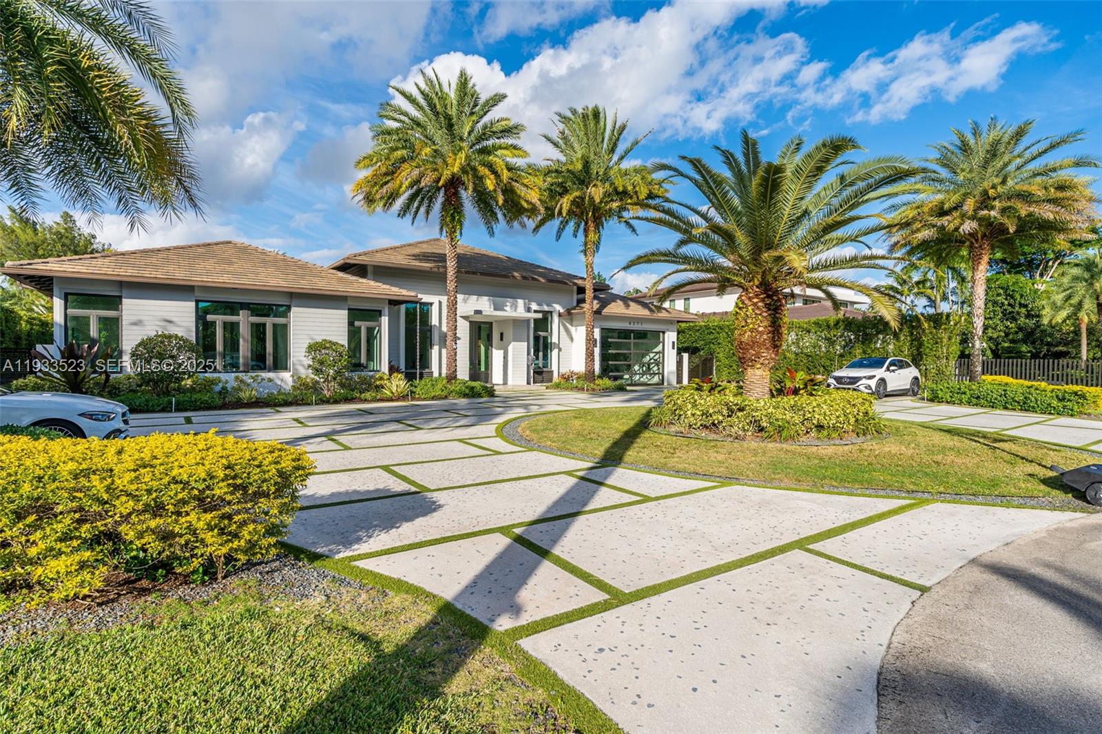 8271 Southwest 67th Street Miami, FL 33143 - Photo 20 of 88 a house with swimming pool in front of it