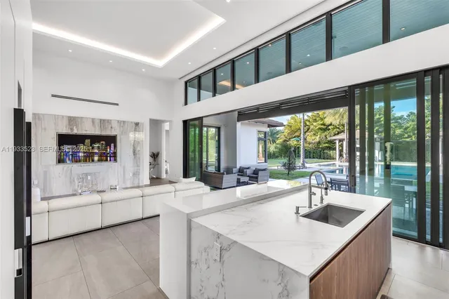a bathroom with a shower and a sink