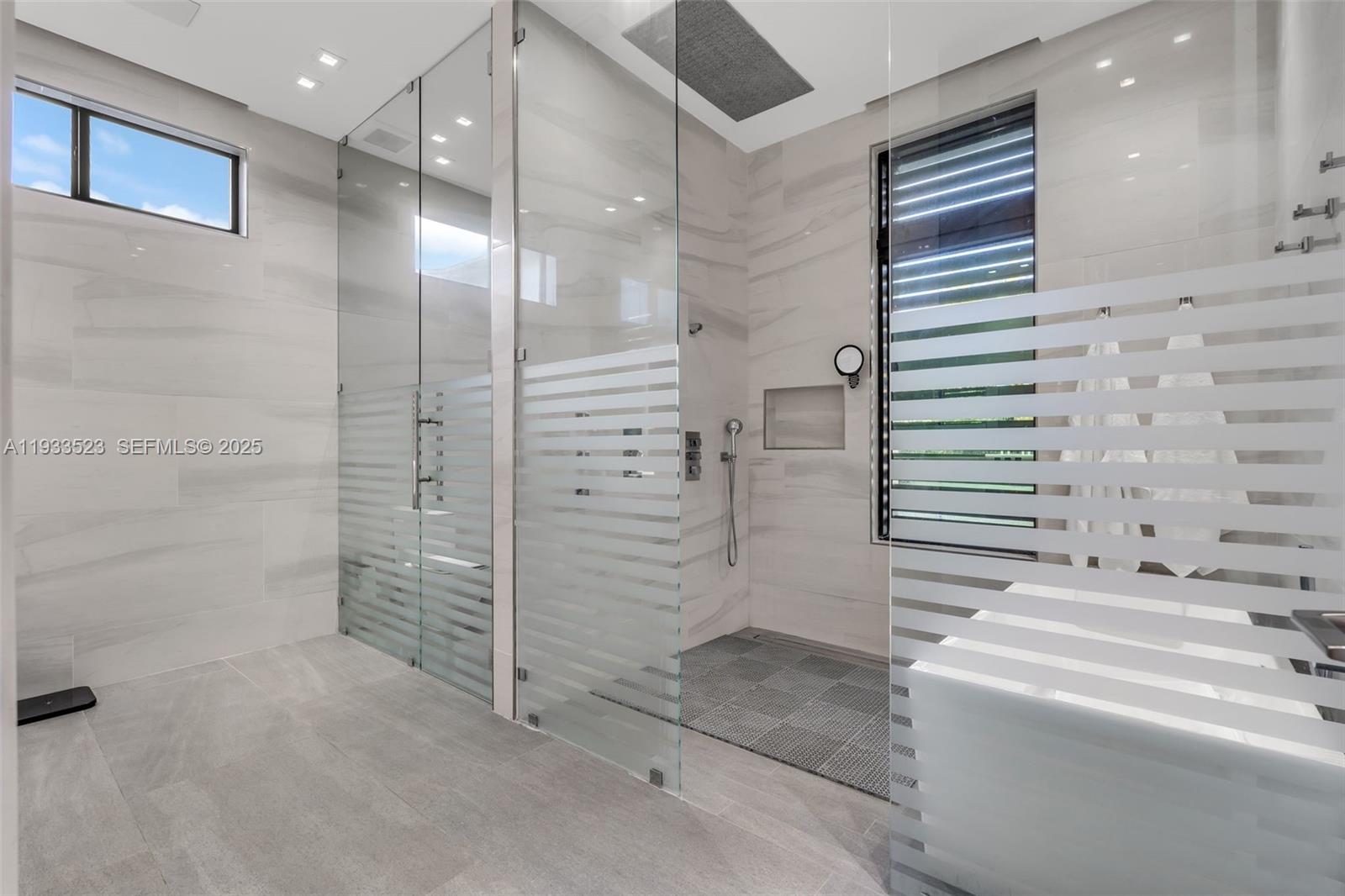 8271 Southwest 67th Street Miami, FL 33143 - Photo 54 of 88 a bathroom with a shower and a sink