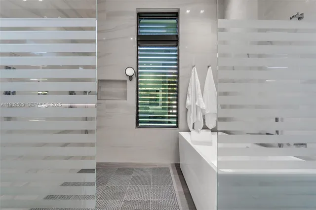 an aerial view of house with swimming pool