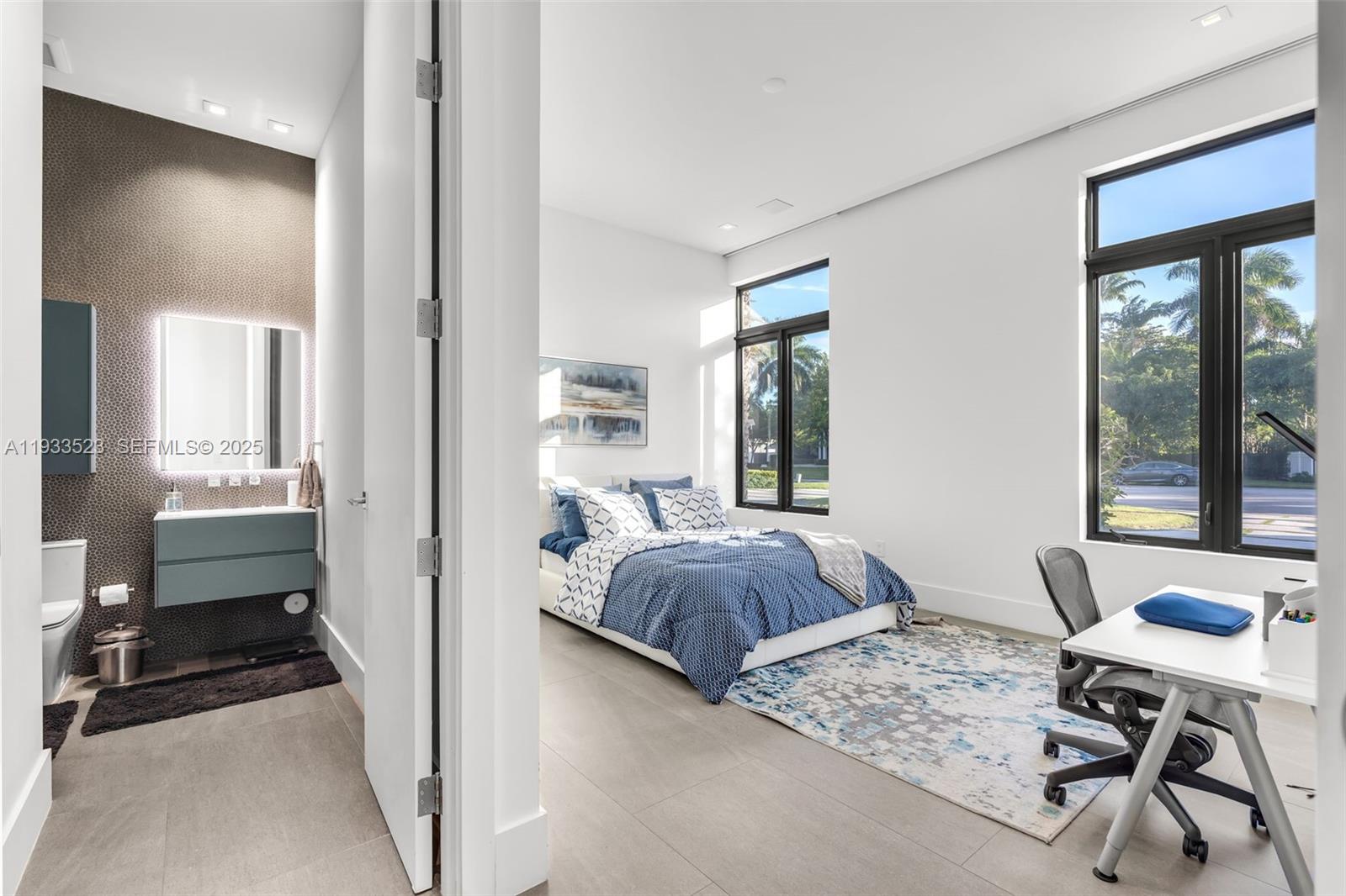 8271 Southwest 67th Street Miami, FL 33143 - Photo 65 of 88 a living room with furniture and a large window