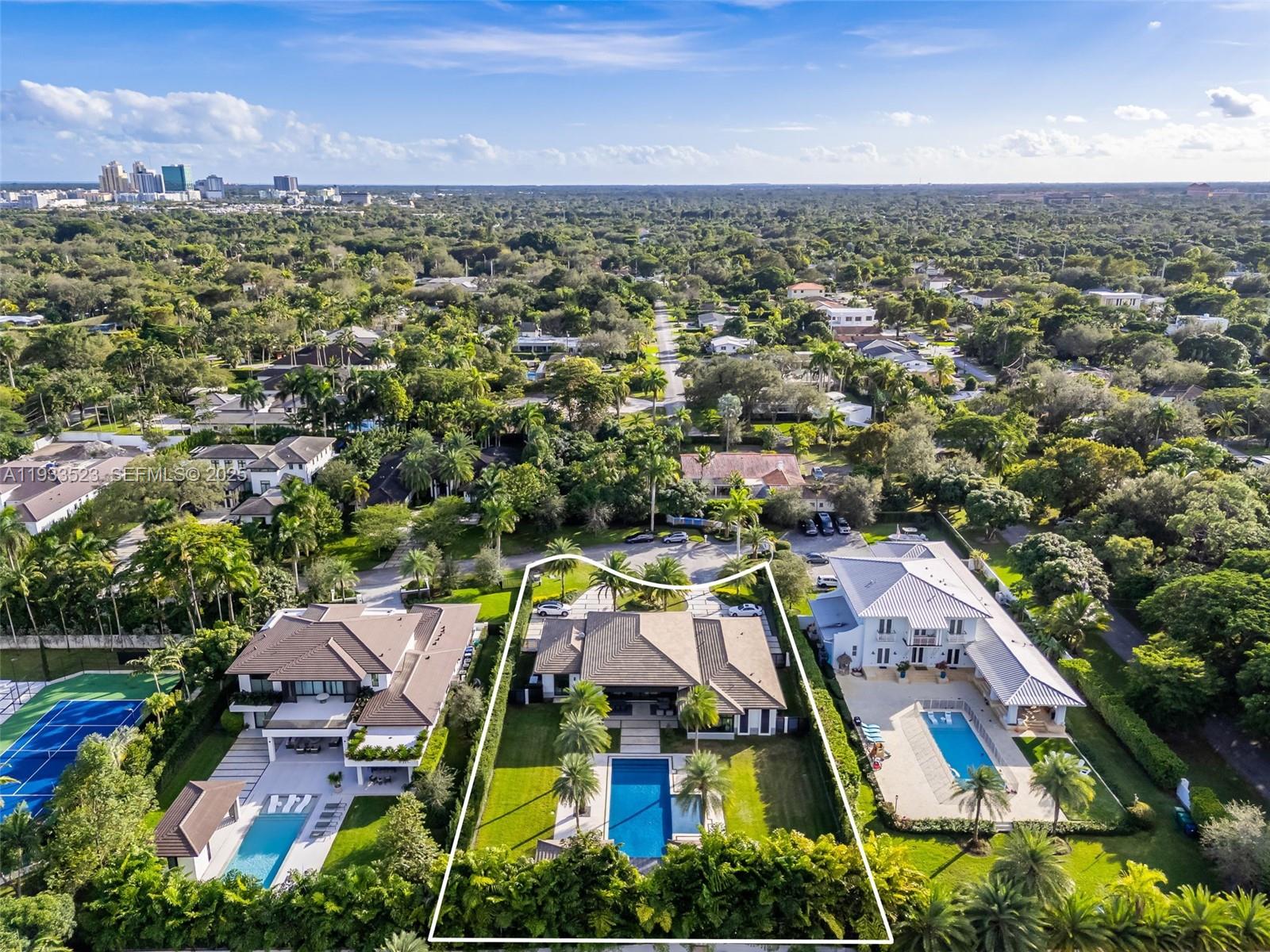 8271 Southwest 67th Street Miami, FL 33143 - Photo 84 of 88 an aerial view of residential houses with outdoor space and trees